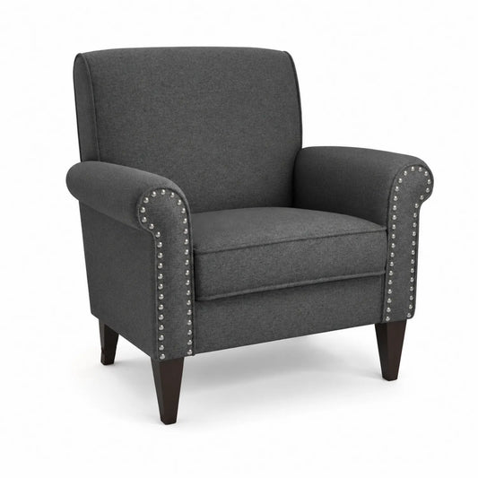Fauteuil en tissu gris avec accoudoirs cloutés